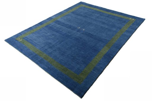 Corner detail of New Persian Gabbeh rug showing border pattern and Wool pile