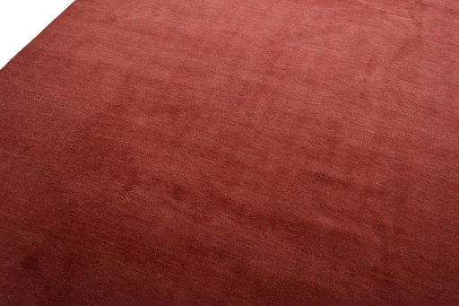 Backside of handmade New Persian Gabbeh rug showing knot structure and weave density