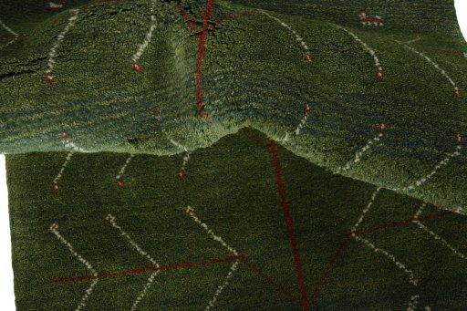 Corner detail of New Persian Gabbeh rug showing border pattern and Wool pile