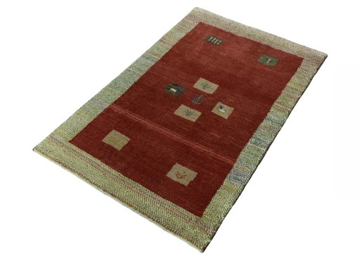 Corner detail of New Persian Gabbeh rug showing border pattern and Wool pile