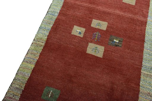 Backside of handmade New Persian Gabbeh rug showing knot structure and weave density