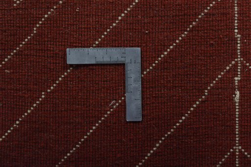 Corner detail of New Persian Gabbeh rug showing border pattern and Wool pile