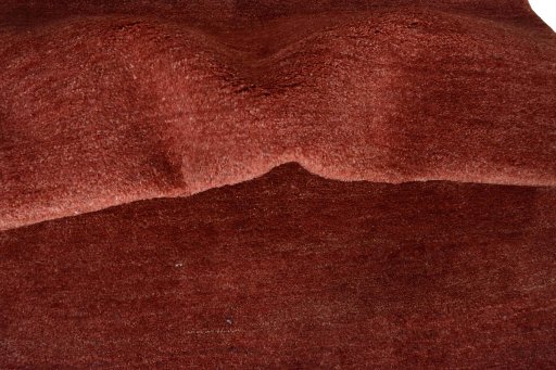 Corner detail of New Persian Gabbeh rug showing border pattern and Wool pile