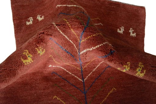 Corner detail of New Persian Gabbeh rug showing border pattern and Wool pile
