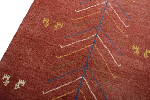 Backside of handmade New Persian Gabbeh rug showing knot structure and weave density