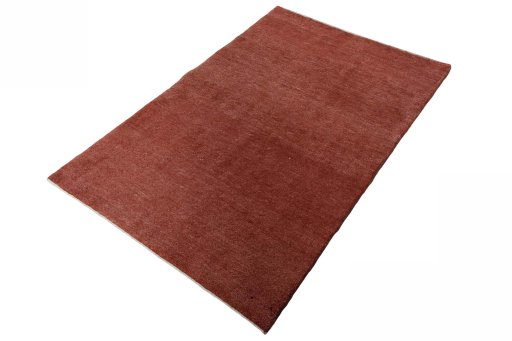Corner detail of New Persian Gabbeh rug showing border pattern and Wool pile