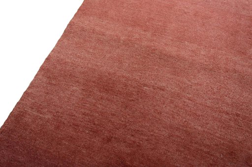 Backside of handmade New Persian Gabbeh rug showing knot structure and weave density
