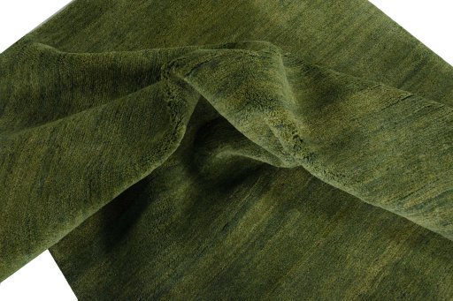 Corner detail of New Persian Gabbeh rug showing border pattern and Wool pile