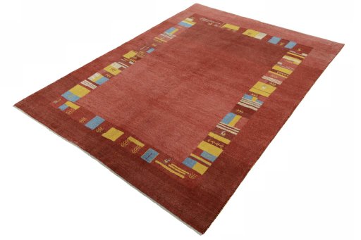 Corner detail of New Persian Gabbeh rug showing border pattern and Wool pile