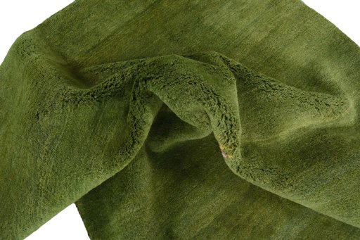 Corner detail of New Persian Gabbeh rug showing border pattern and Wool pile