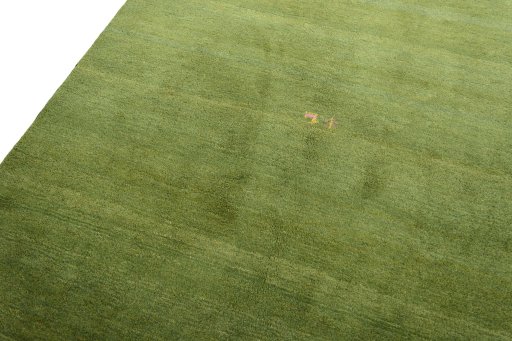 Backside of handmade New Persian Gabbeh rug showing knot structure and weave density