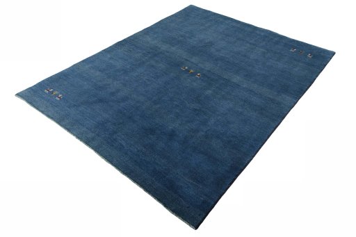Corner detail of New Persian Gabbeh rug showing border pattern and Wool pile