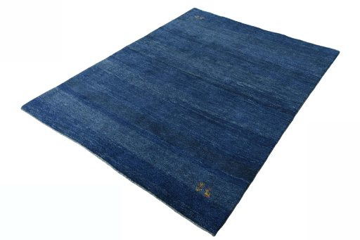 Corner detail of New Persian Gabbeh rug showing border pattern and Wool pile