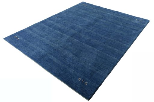 Corner detail of New Persian Gabbeh rug showing border pattern and Wool pile