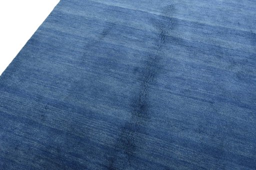 Backside of handmade New Persian Gabbeh rug showing knot structure and weave density