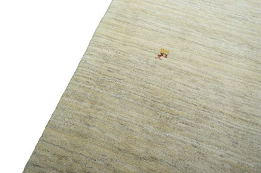 Backside of handmade New Persian Gabbeh rug showing knot structure and weave density