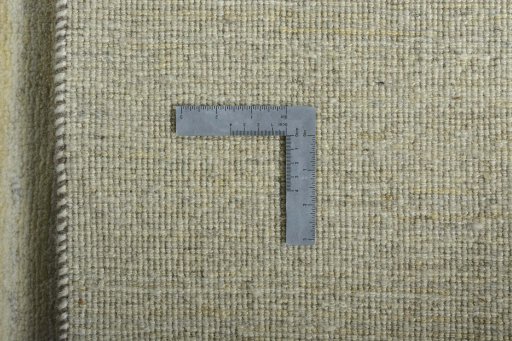 Corner detail of New Persian Gabbeh rug showing border pattern and Wool pile