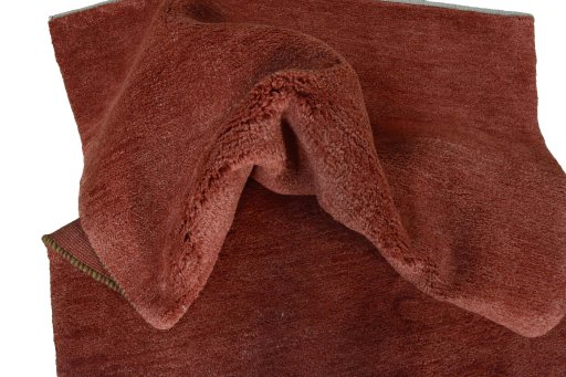 Corner detail of New Persian Gabbeh rug showing border pattern and Wool pile