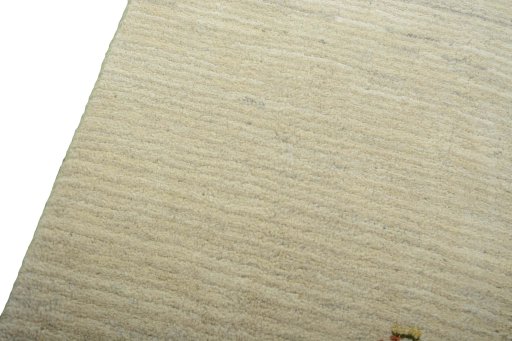 Backside of handmade New Persian Gabbeh rug showing knot structure and weave density