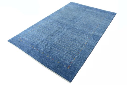 Corner detail of New Persian Gabbeh rug showing border pattern and Wool pile