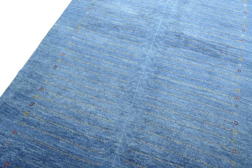 Backside of handmade New Persian Gabbeh rug showing knot structure and weave density