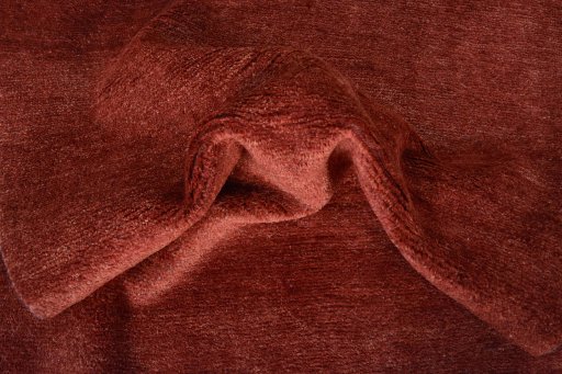 Corner detail of New Persian Gabbeh rug showing border pattern and Wool pile