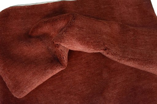 Corner detail of New Persian Gabbeh rug showing border pattern and Wool pile