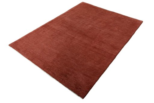 Corner detail of New Persian Gabbeh rug showing border pattern and Wool pile