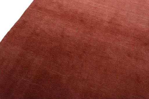 Backside of handmade New Persian Gabbeh rug showing knot structure and weave density