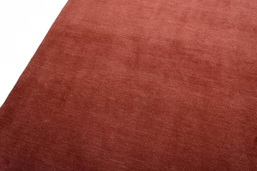 Backside of handmade New Persian Gabbeh rug showing knot structure and weave density