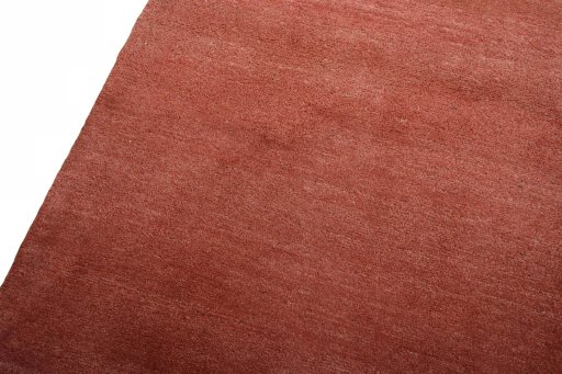 Backside of handmade New Persian Gabbeh rug showing knot structure and weave density