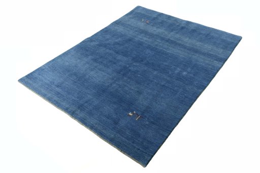Corner detail of New Persian Gabbeh rug showing border pattern and Wool pile