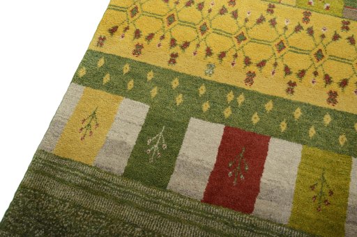 Backside of handmade New Persian Gabbeh rug showing knot structure and weave density