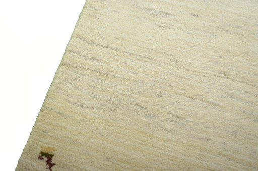 Backside of handmade New Persian Gabbeh rug showing knot structure and weave density