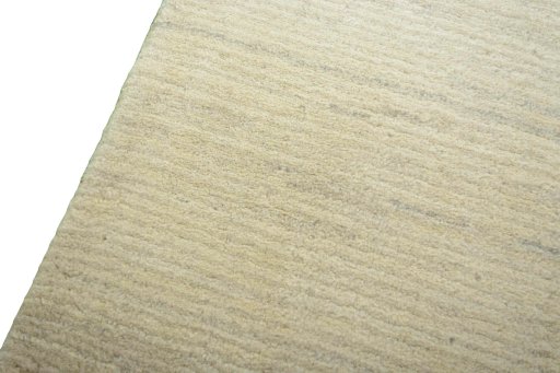 Backside of handmade New Persian Gabbeh rug showing knot structure and weave density
