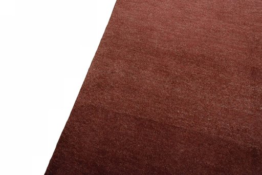 Backside of handmade New Persian Gabbeh rug showing knot structure and weave density