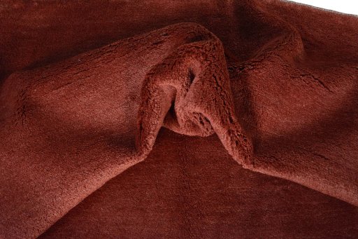 Corner detail of New Persian Gabbeh rug showing border pattern and Wool pile