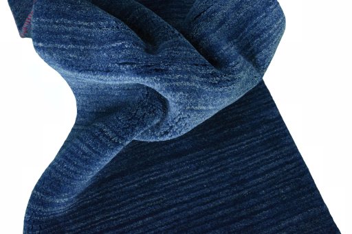 Corner detail of New Persian Gabbeh rug showing border pattern and Wool pile