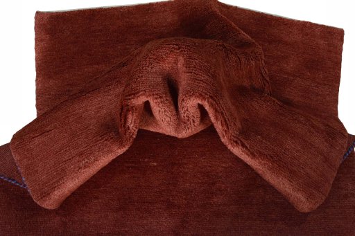 Corner detail of New Persian Gabbeh rug showing border pattern and Wool pile