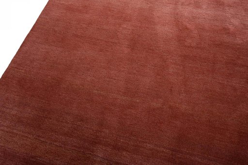 Backside of handmade New Persian Gabbeh rug showing knot structure and weave density