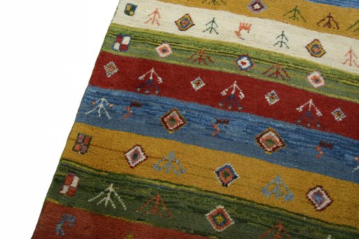 Backside of handmade New Persian Gabbeh rug showing knot structure and weave density