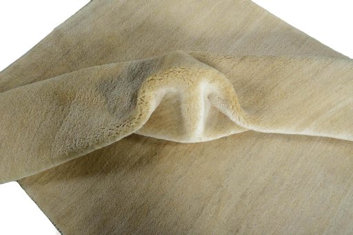 Corner detail of New Persian Gabbeh rug showing border pattern and Wool pile