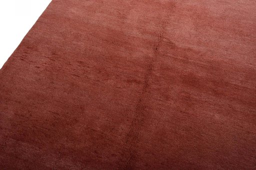 Backside of handmade New Persian Gabbeh rug showing knot structure and weave density