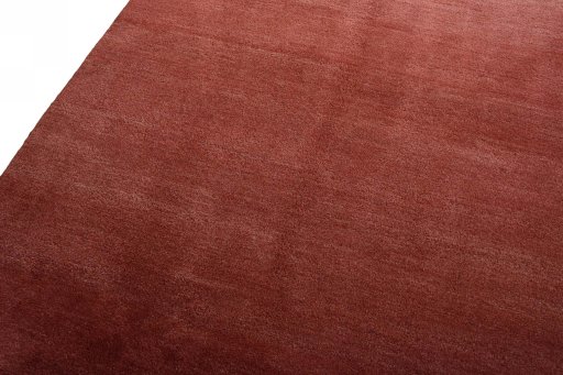 Backside of handmade New Persian Gabbeh rug showing knot structure and weave density