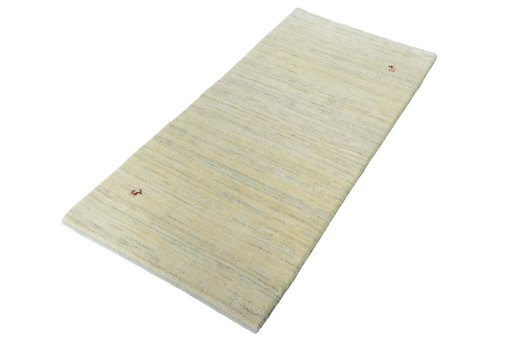 Corner detail of New Persian Gabbeh rug showing border pattern and Wool pile