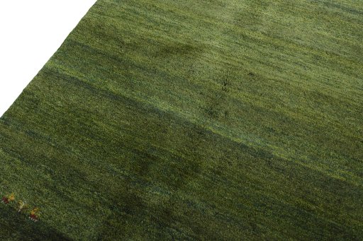 Backside of handmade New Persian Gabbeh rug showing knot structure and weave density