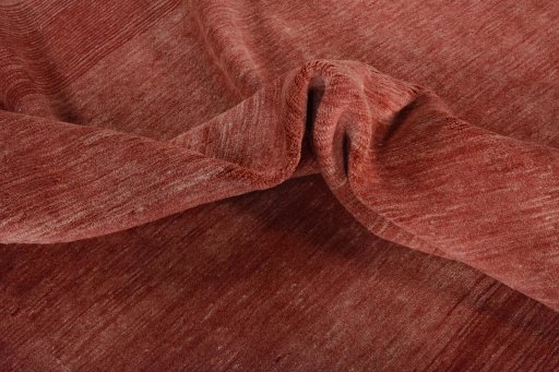 Corner detail of New Persian Gabbeh rug showing border pattern and Wool pile