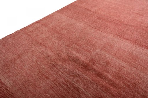 Backside of handmade New Persian Gabbeh rug showing knot structure and weave density