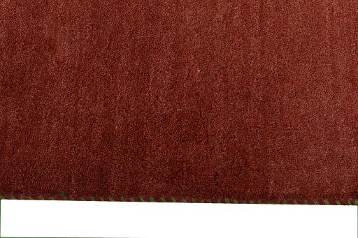 Close-up detail of New Persian Gabbeh rug from Iran / Persia showing Wool weave