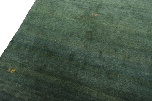 Backside of handmade New Persian Gabbeh rug showing knot structure and weave density